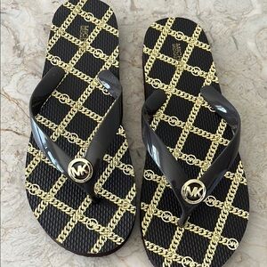 Michael Kors Black and Gold Flip Flops